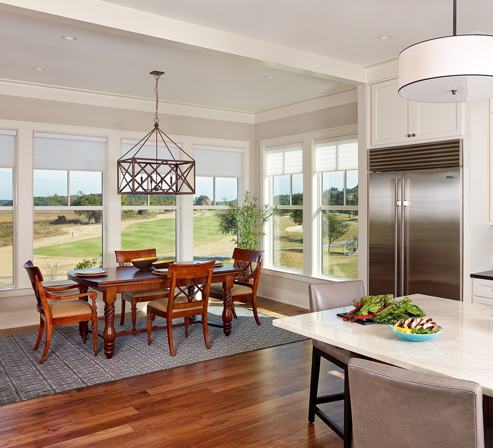 Inspiration for a beach style kitchen/dining combo in Charleston with grey walls and dark hardwood floors.