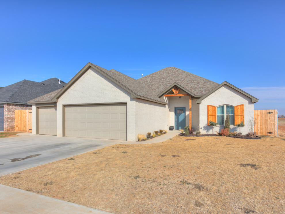 Brick with cedar shutters and entry way