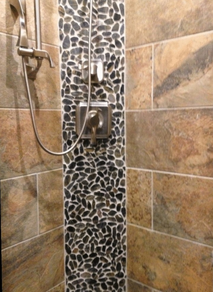 Bathroom - rustic multicolored tile and porcelain tile bathroom idea in Little Rock