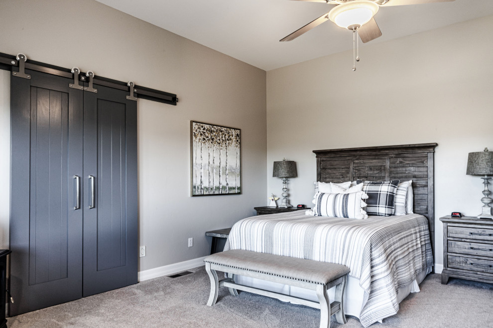 Bedroom - large country master carpeted and gray floor bedroom idea in Phoenix with gray walls