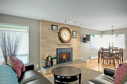 Ideas on updating this large fireplace... Originally a wood burning fire place that was converted to gas. The entire front side of my house is the same brick running up to the chimney. It is extremely large and would like some ideas on how to update it. My home is mid century modern. I have enclosed the real estate photos when I bought th...