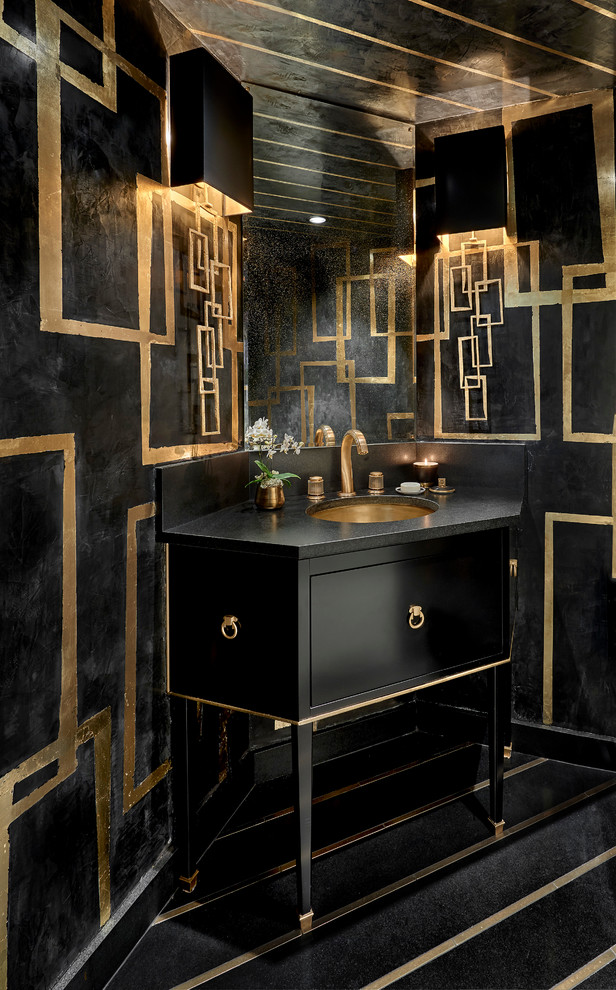 Photo of a mid-sized contemporary powder room in Chicago with flat-panel cabinets, black cabinets, a two-piece toilet, black walls, porcelain floors, an undermount sink, quartzite benchtops, black floor, black benchtops, a built-in vanity, wallpaper and wallpaper.