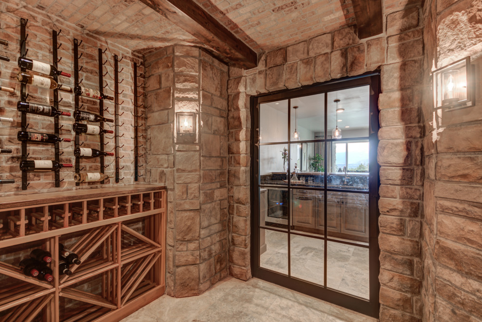 Example of a transitional home design design in Denver