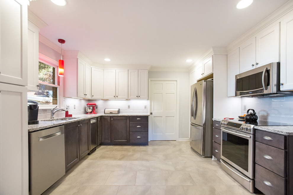 Mid-sized transitional u-shaped porcelain tile enclosed kitchen photo in Birmingham with a double-bowl sink, shaker cabinets, granite countertops, gray backsplash, ceramic backsplash, stainless steel appliances and no island