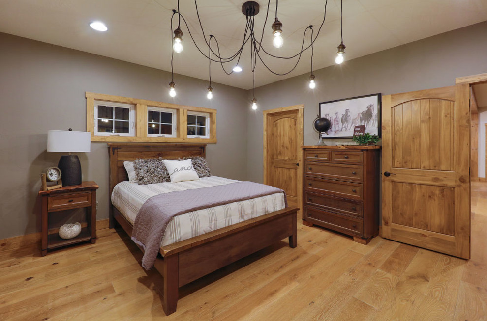 Design ideas for a country bedroom in Cleveland.