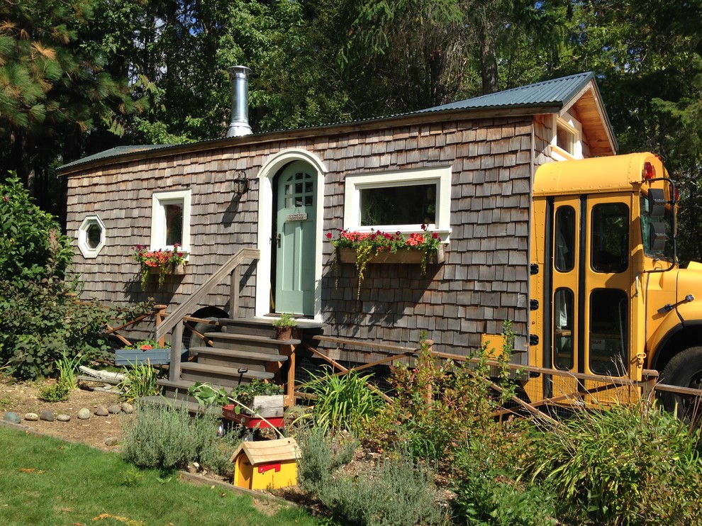 Design ideas for a small arts and crafts one-storey exterior in Seattle with wood siding.