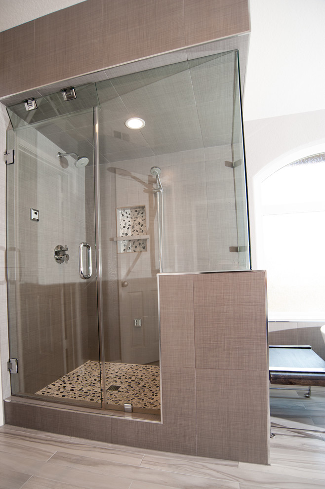Photo of a large contemporary master bathroom in San Diego with flat-panel cabinets, dark wood cabinets, a freestanding tub, a corner shower, a two-piece toilet, gray tile, porcelain tile, grey walls, ceramic floors, a vessel sink and quartzite benchtops.