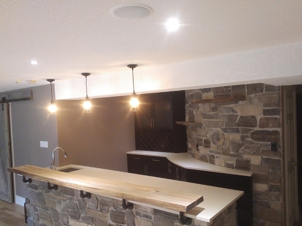 Mid-sized mountain style home design photo in Toronto