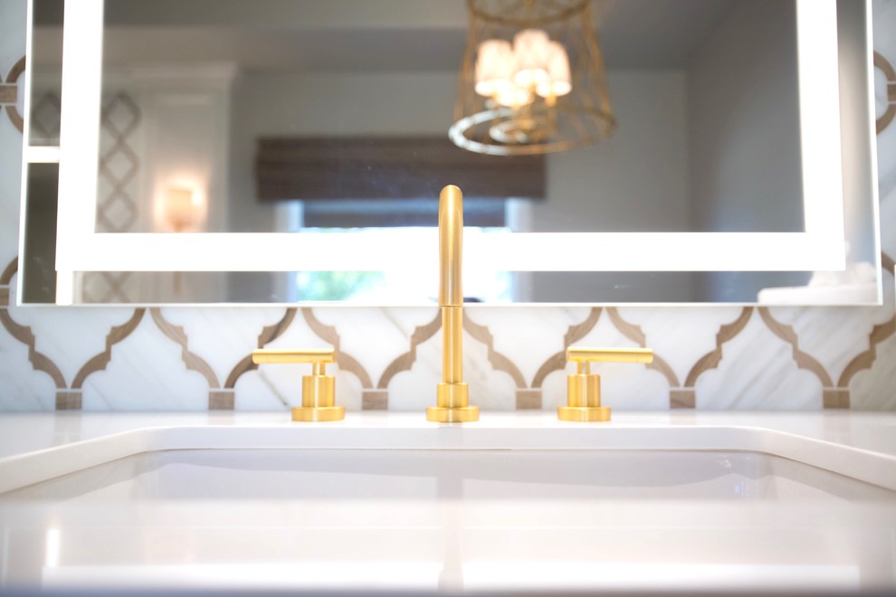 Inspiration for a transitional master white tile and stone tile marble floor home design remodel in Phoenix with recessed-panel cabinets, white cabinets, gray walls, an undermount sink and quartz countertops