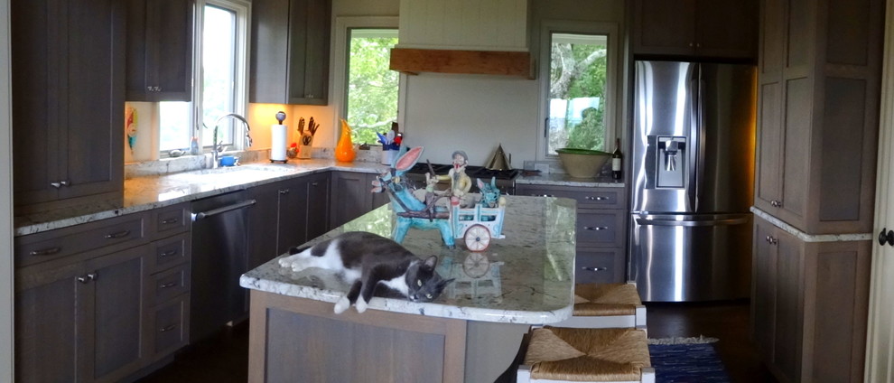 Eat-in kitchen - mid-sized transitional l-shaped dark wood floor eat-in kitchen idea in Charlotte with an undermount sink, shaker cabinets, gray cabinets, granite countertops, white backsplash, stainless steel appliances and an island