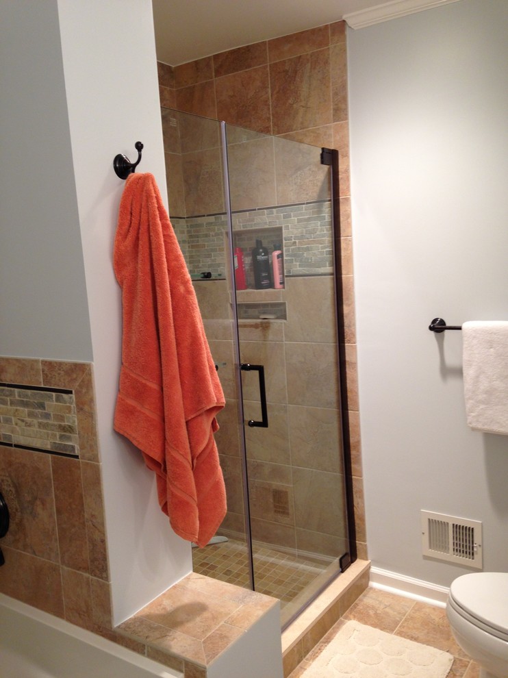 Example of a large transitional master multicolored tile and porcelain tile porcelain tile alcove bathtub design in Baltimore with an integrated sink, raised-panel cabinets, white cabinets, solid surface countertops, a two-piece toilet and blue walls