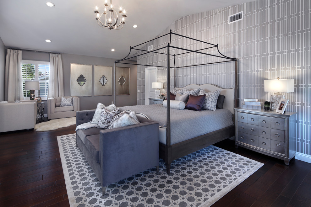Photo of a large contemporary master bedroom in Orange County with grey walls, dark hardwood floors, no fireplace and black floor.