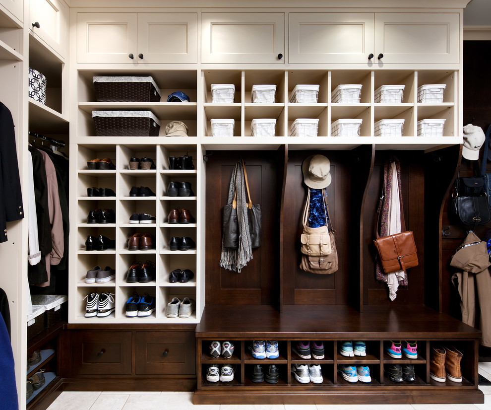 Traditional storage and wardrobe in Toronto with white cabinets.