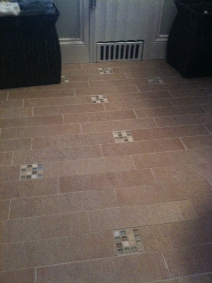 Example of a transitional bathroom design in Boston