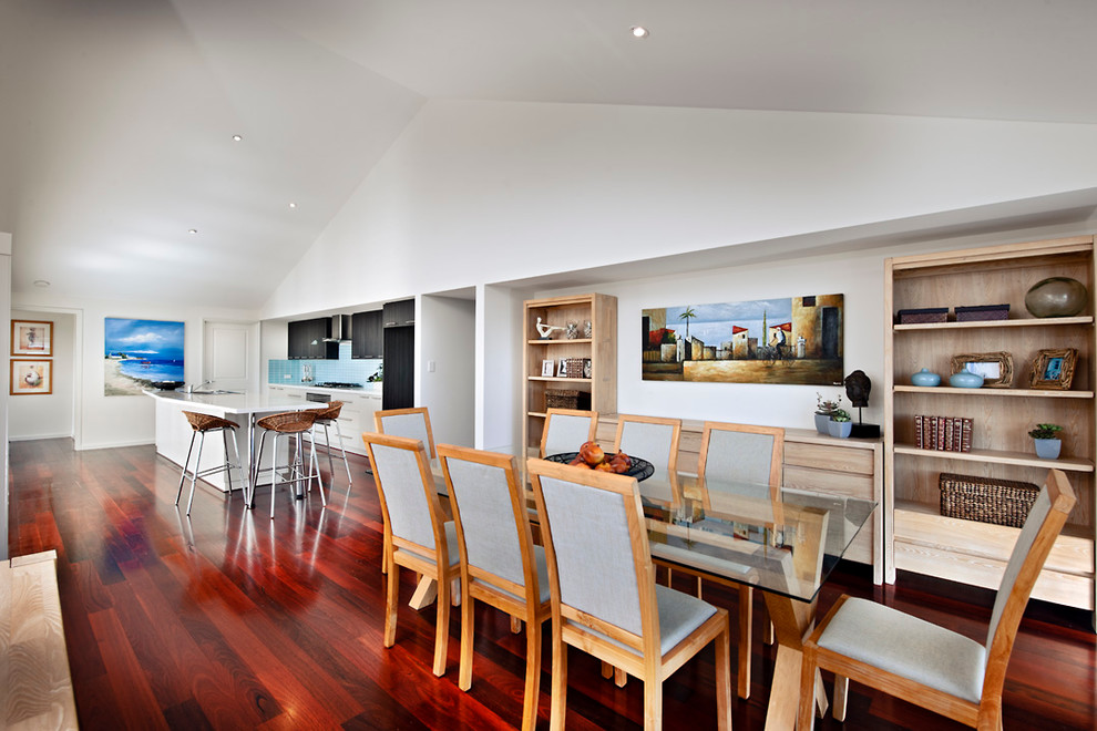 Photo of a mid-sized contemporary dining room in Perth with white walls and vinyl floors.