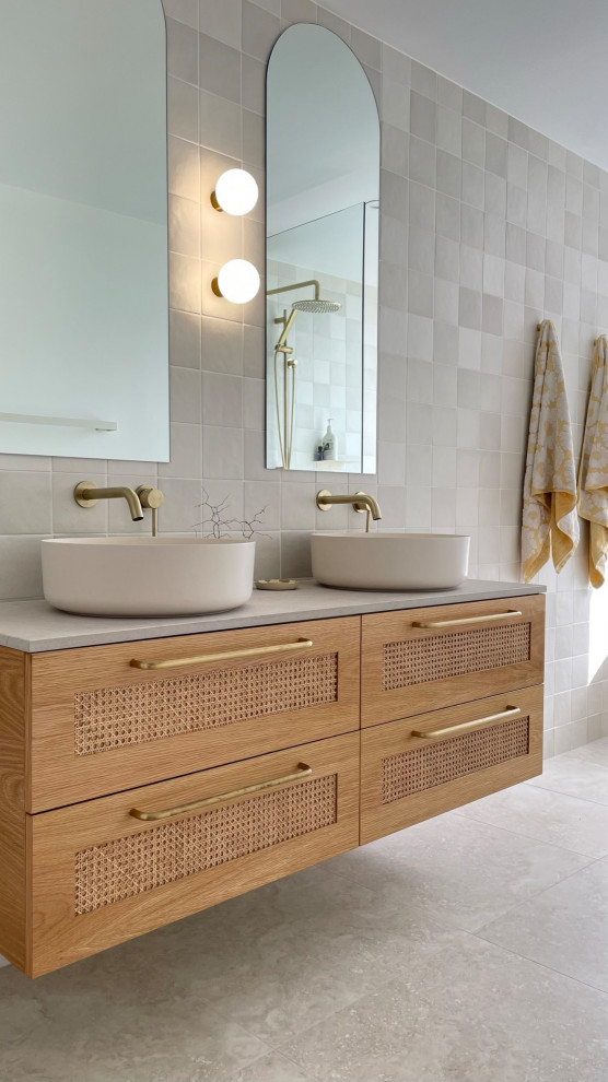 Design ideas for a Large contemporary Master bathroom in Dunedin With Shaker Cabinets, Light Wood Cabinets, Gray Tile, Porcelain Tile, Grey Walls, Porcelain Floors, a Vessel Sink, Engineered Quartz Benchtops, Grey Floor, Grey Benchtops, a Double Vanity and a Floating Vanity.