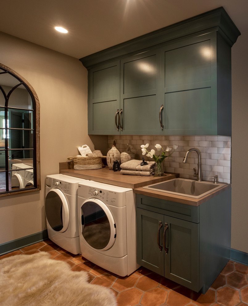 Photo of a mediterranean laundry room in Minneapolis.