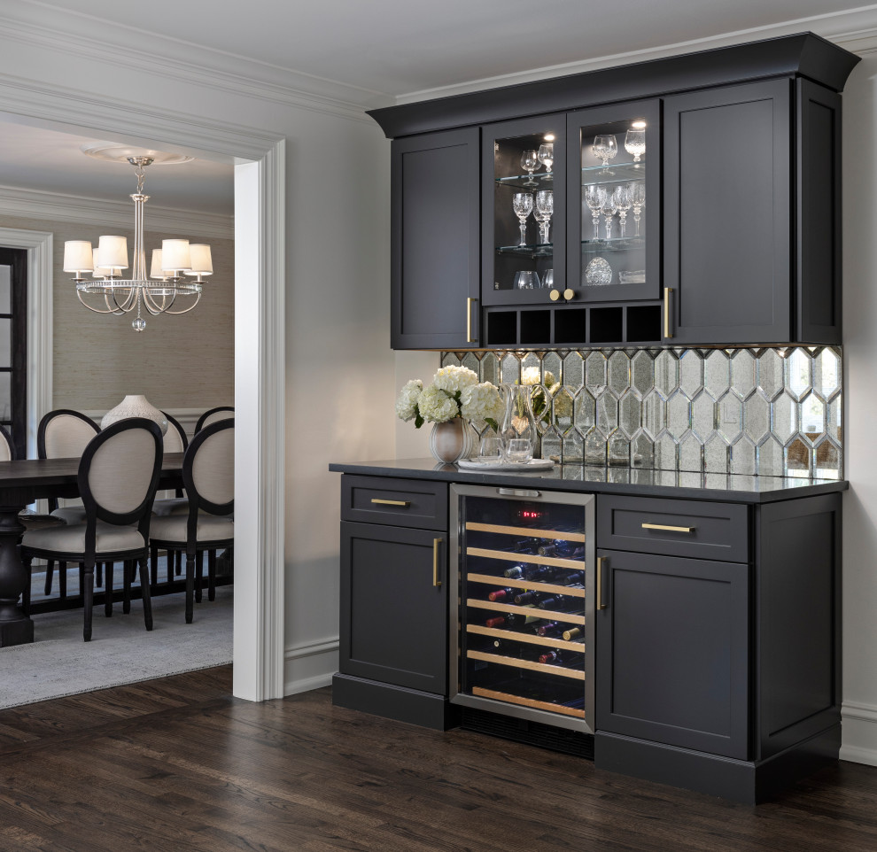 Example of a small transitional dark wood floor and brown floor home bar design in Detroit
