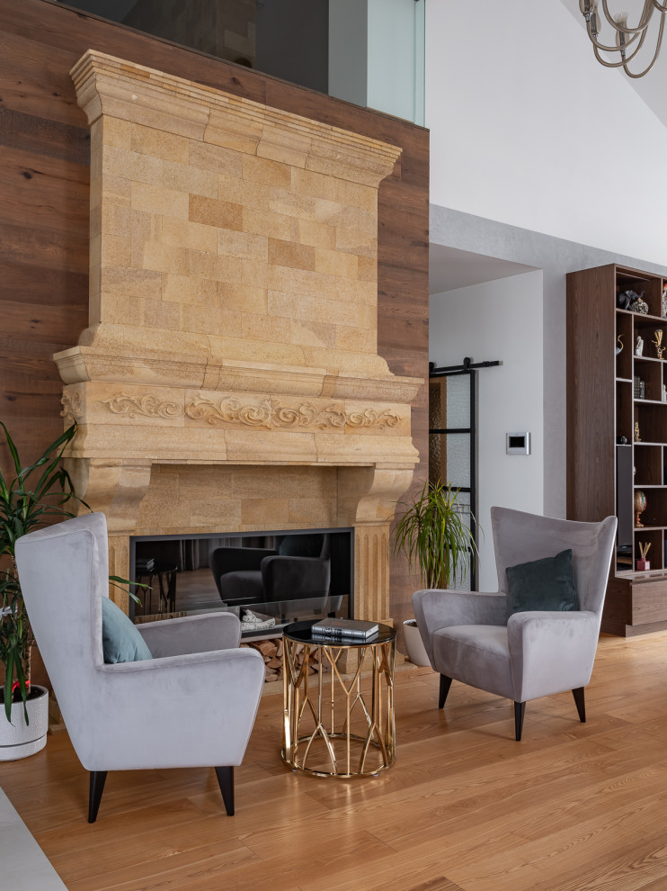 This is an example of a mid-sized transitional formal enclosed living room in Moscow with white walls, porcelain floors, beige floor, wood and brick walls.