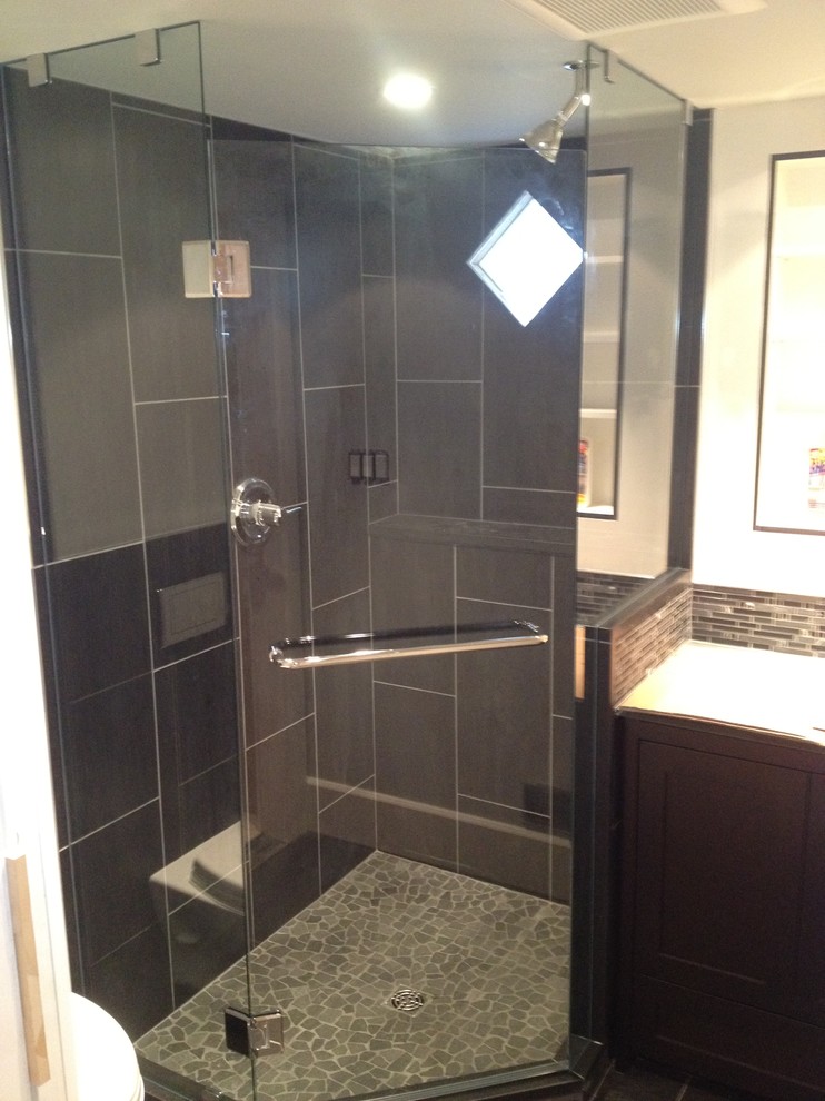 Large contemporary master bathroom in Vancouver with a corner shower, multi-coloured tile, glass tile and white walls.