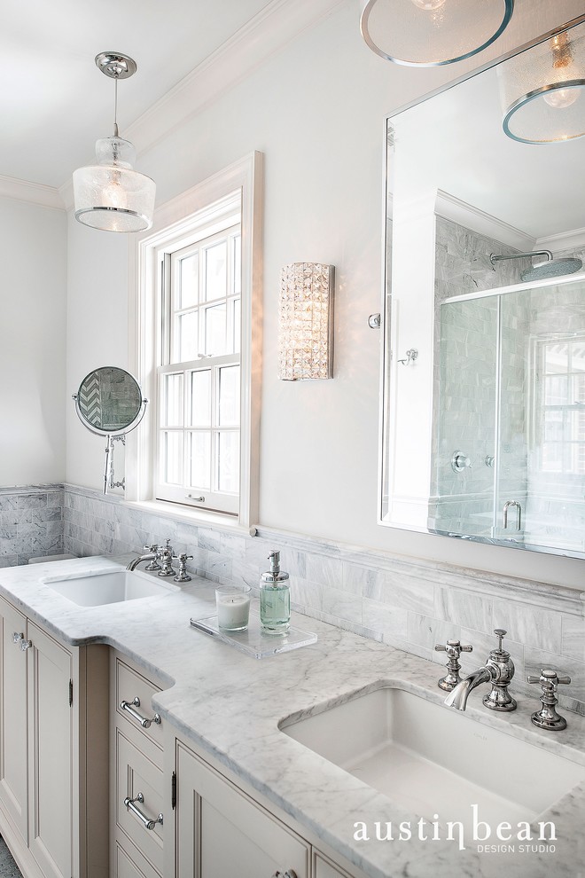 Inspiration for a transitional master gray tile and stone tile double shower remodel with an undermount sink, beaded inset cabinets, white cabinets, marble countertops and a one-piece toilet
