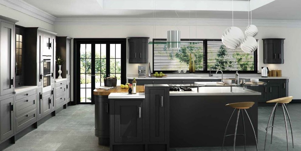 Inspiration for a large transitional l-shaped eat-in kitchen in Cheshire with shaker cabinets, grey cabinets, quartzite benchtops, cement tiles and with island.