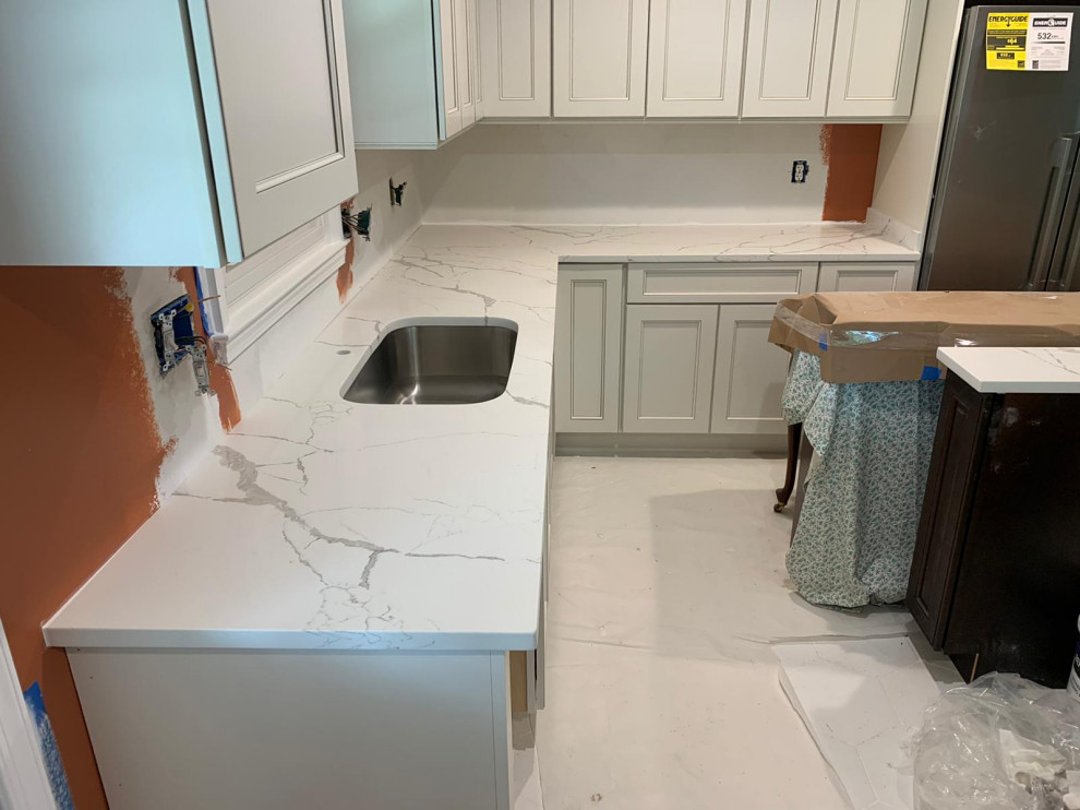Example of a mid-sized kitchen design in DC Metro with two islands