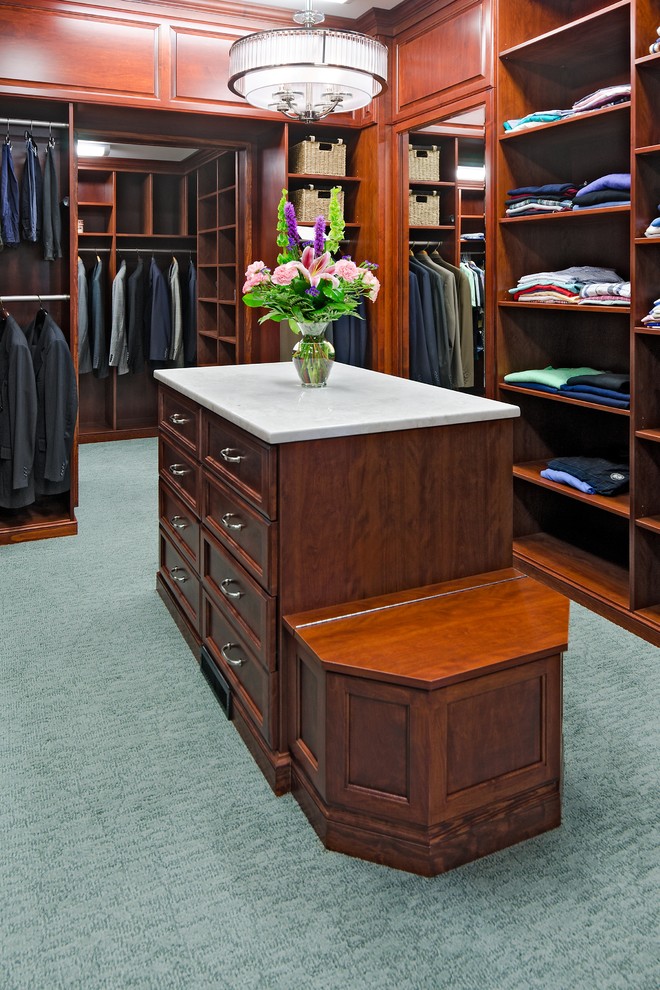 Inspiration for a large traditional men's walk-in wardrobe in Los Angeles with medium wood cabinets and recessed-panel cabinets.