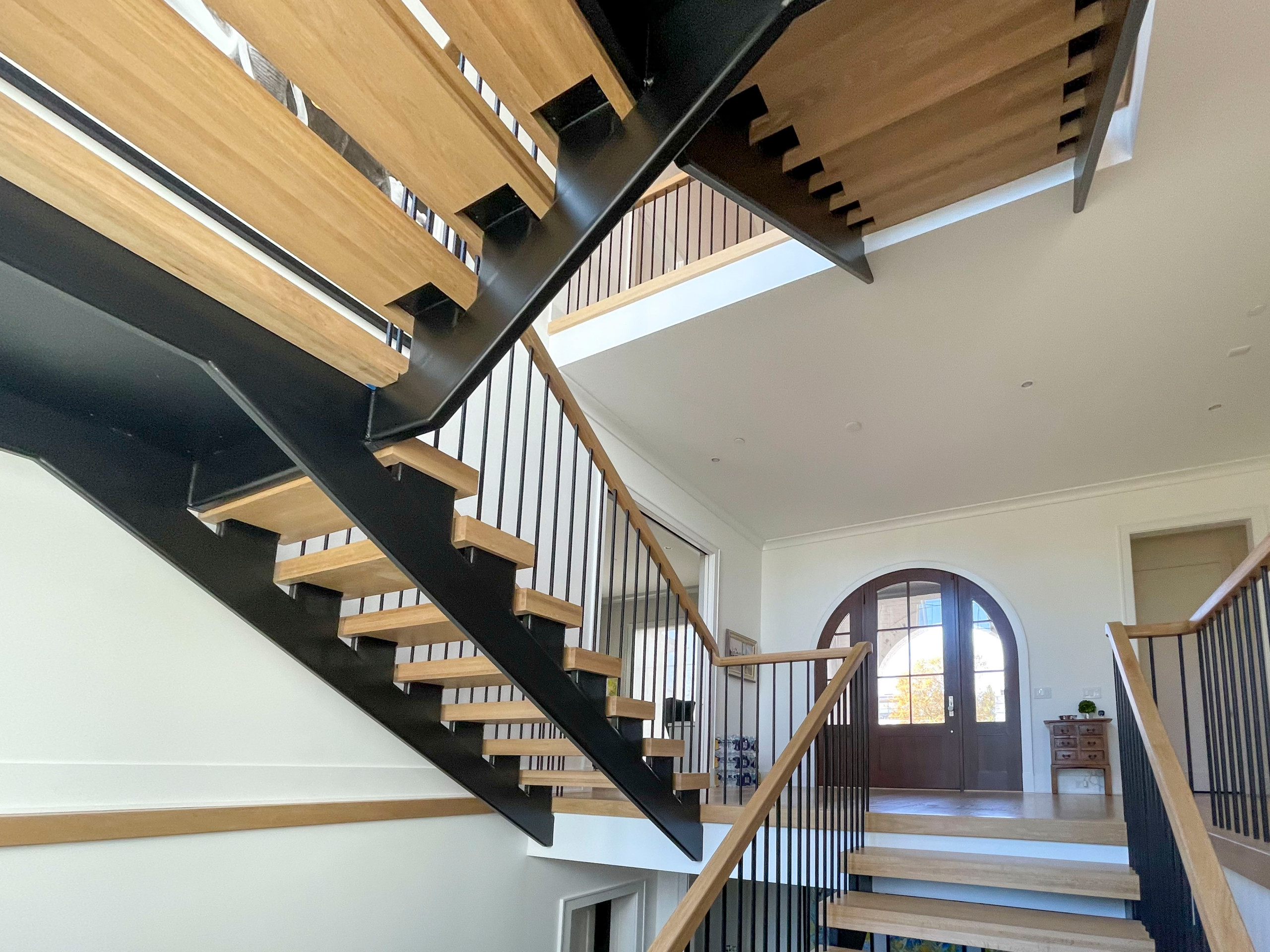 96_Dramatic cantilevered no-riser staircase, Bethesda, MD 20814