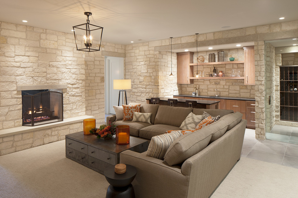 Transitional living room in Grand Rapids with a standard fireplace, a stone fireplace surround, ceramic floors, white walls and brown floor.