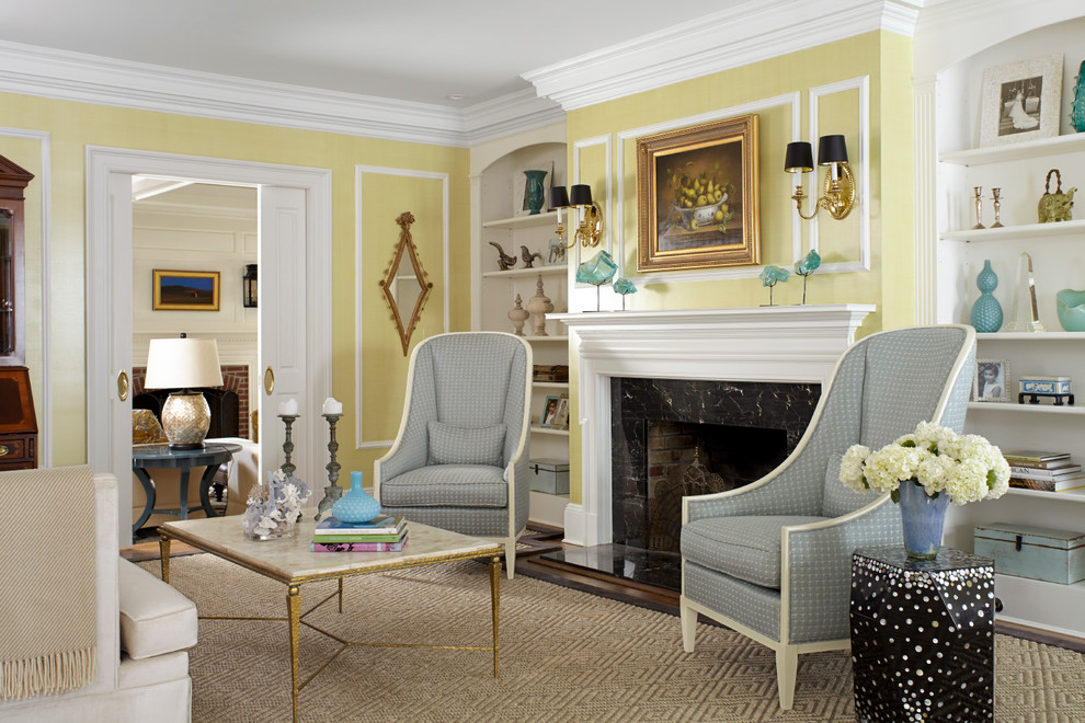 Inspiration for a traditional enclosed living room in New York with yellow walls, a standard fireplace, a stone fireplace surround and dark hardwood floors.
