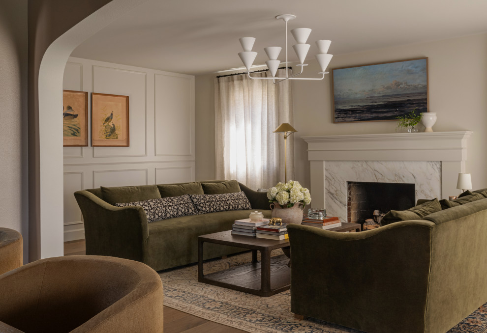 Living room - large traditional formal and enclosed medium tone wood floor living room idea in Seattle with beige walls, a standard fireplace, a stone fireplace and no tv