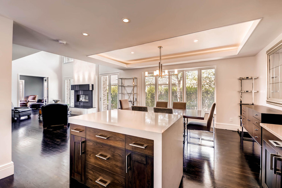 Large transitional l-shaped dark wood floor eat-in kitchen photo in Denver with an undermount sink, shaker cabinets, dark wood cabinets, quartz countertops, stainless steel appliances and two islands