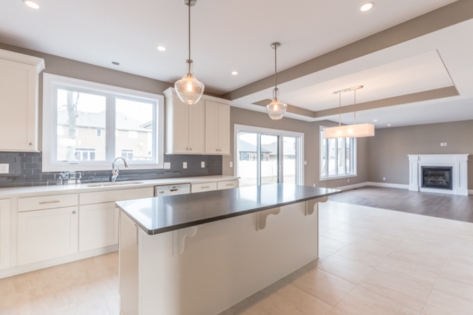 Example of a transitional kitchen design in Toronto