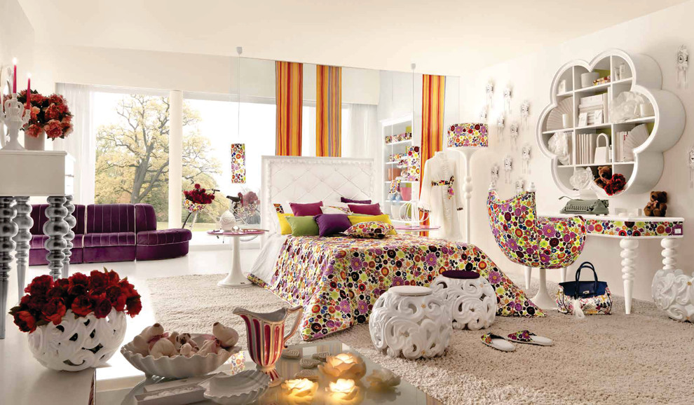 Inspiration for a large modern kids' room for girls in London with white walls and carpet.