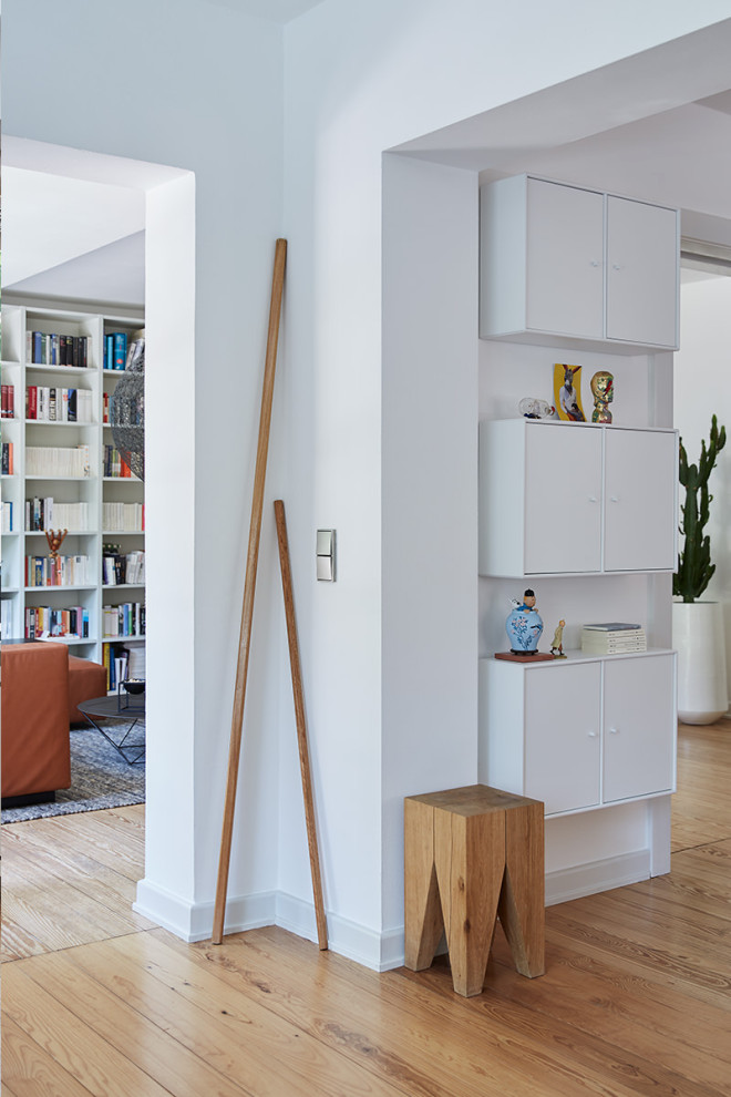 This is an example of a scandinavian family room in Hamburg.