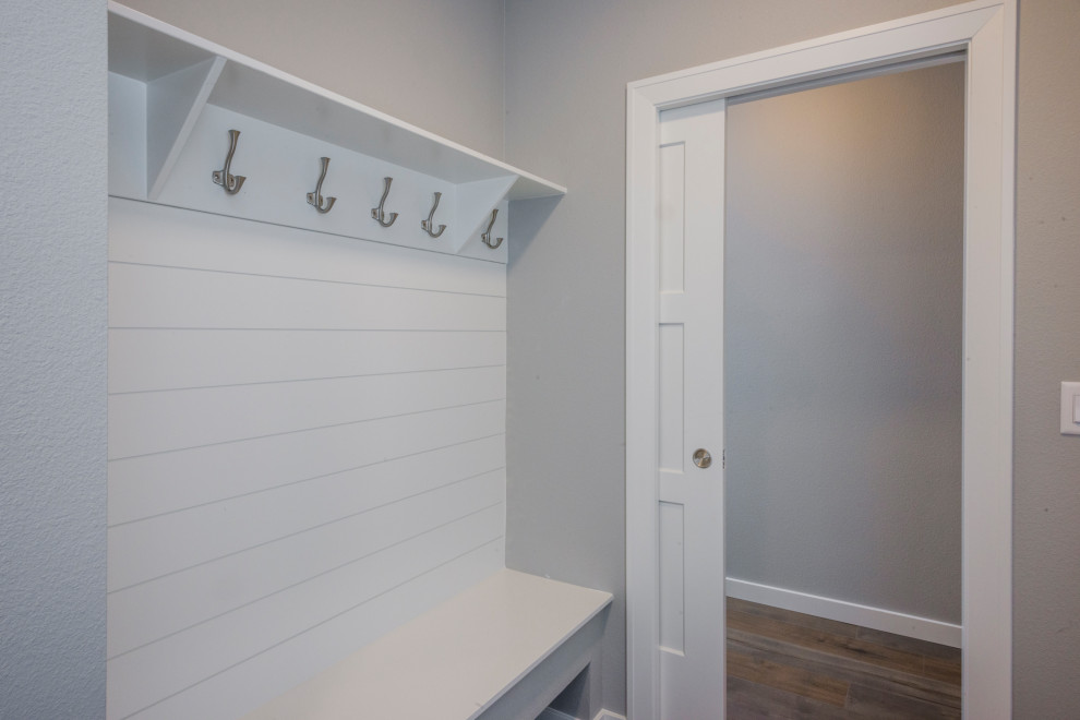 Transitional laundry room in Portland.