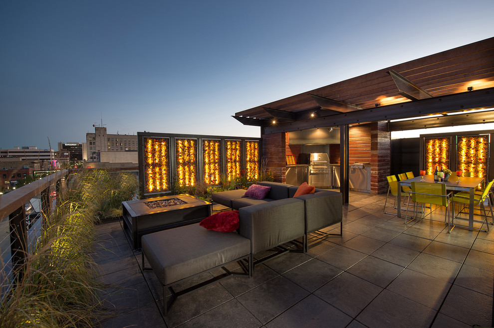Photo of a contemporary patio in Other with an outdoor kitchen.