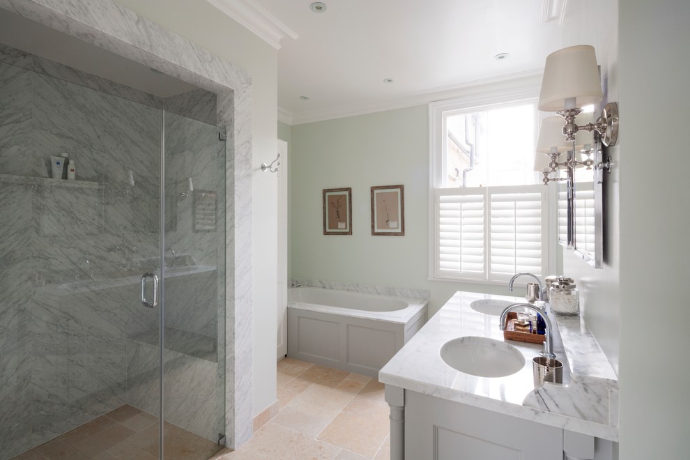 Design ideas for a mid-sized transitional bathroom in London.