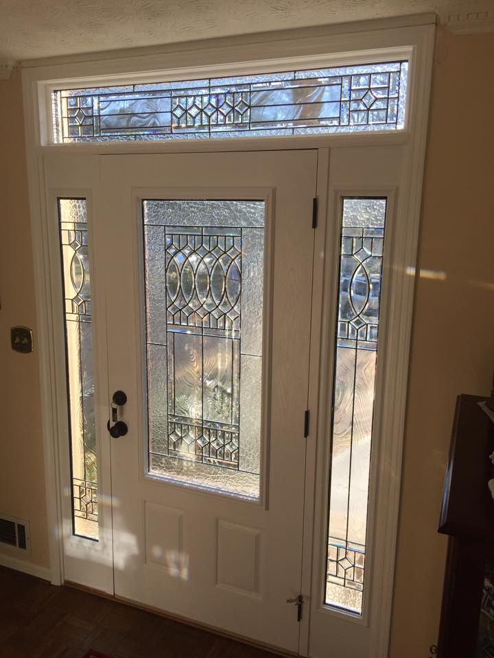 Inspiration for a large transitional front door remodel in Atlanta with a white front door