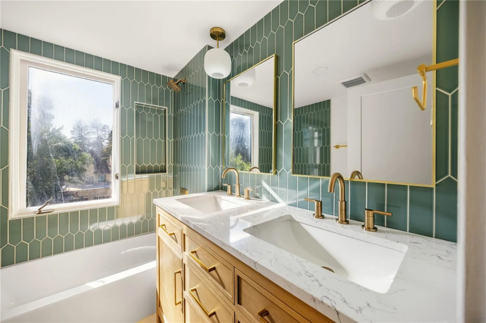 Luxurious details in gold complement the geometric green palette for a refined, 