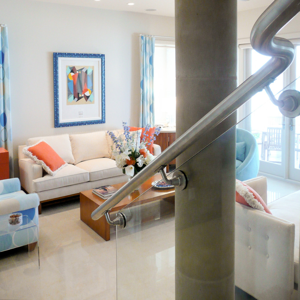Mid-sized trendy concrete glass railing staircase photo in Miami with concrete risers