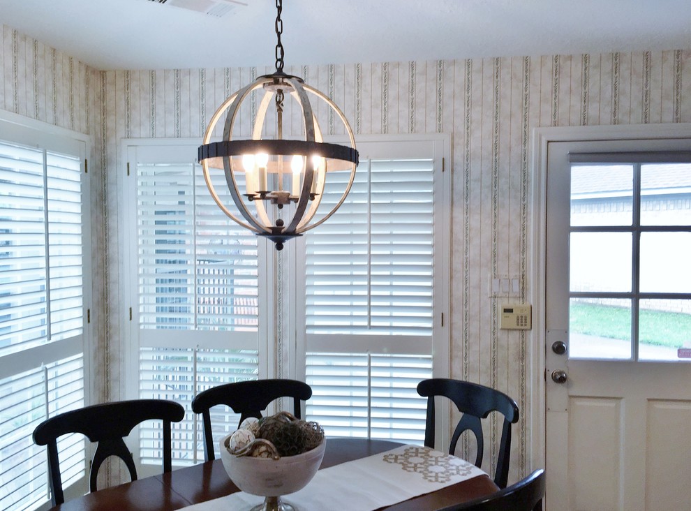 Example of a transitional dining room design in Houston