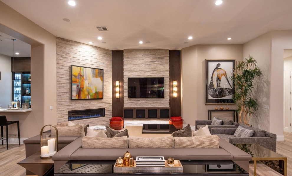 This is an example of a large contemporary living room in Phoenix with a built-in media unit.