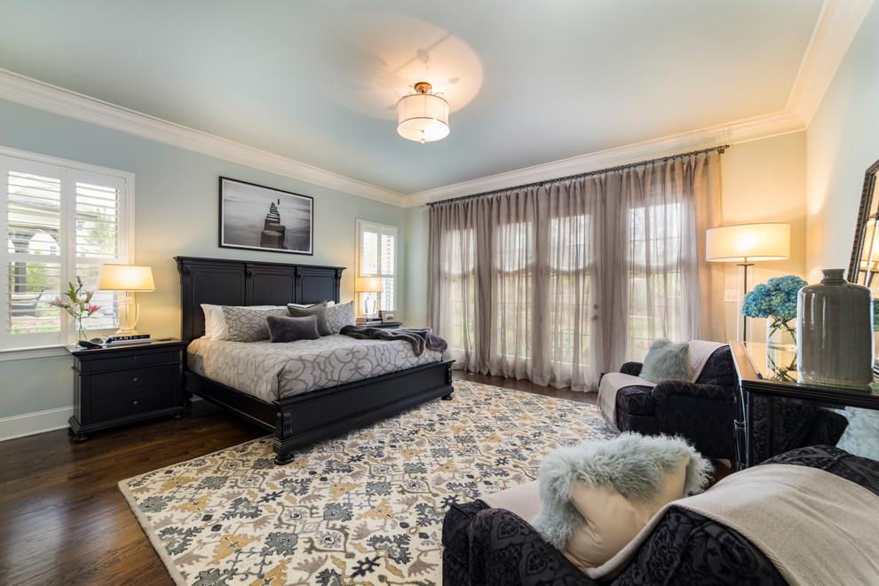 Design ideas for a large transitional master bedroom in Raleigh with grey walls, dark hardwood floors, no fireplace and brown floor.
