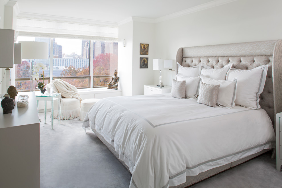Design ideas for a transitional bedroom in New York with white walls.