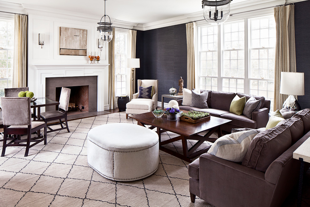 Photo of a traditional formal living room in New York with black walls, carpet and a standard fireplace.