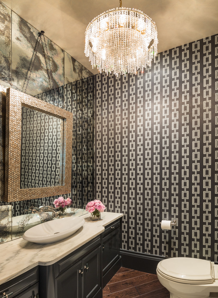 Photo of a transitional powder room in Portland.