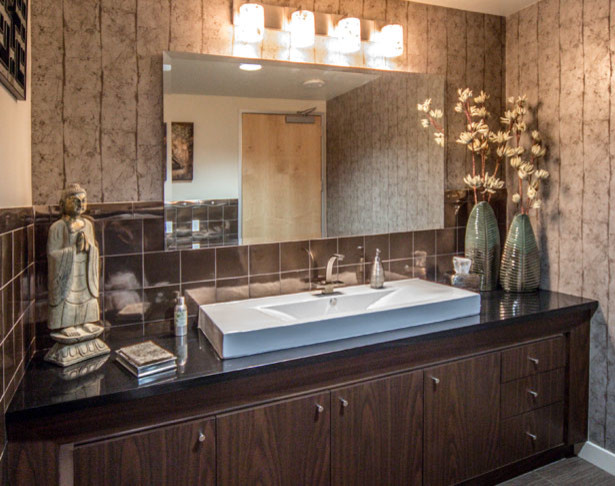 Inspiration for a large contemporary master bathroom in San Francisco with furniture-like cabinets, dark wood cabinets, a drop-in sink, beige tile, porcelain tile, beige walls and porcelain floors.