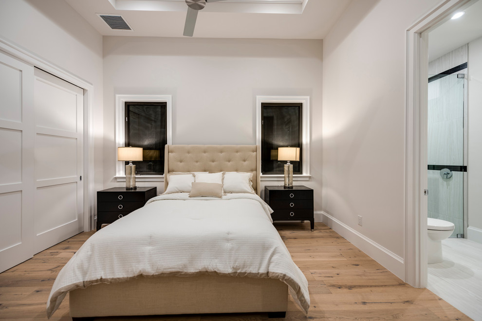 Design ideas for a mid-sized beach style guest bedroom in Other with grey walls, marble floors and coffered.